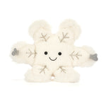 Plush toy with snowflake patterns on a white background
