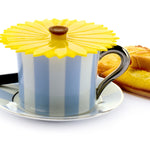 Charles Viancin Drink Cover Sunflower covering a cup of coffee with cookies