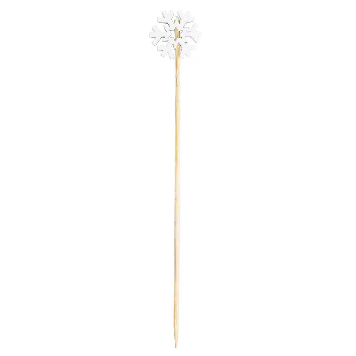 Wooden skewer with a decorative top on a white background