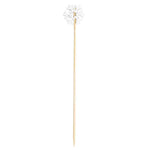 Wooden skewer with a decorative top on a white background