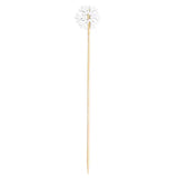 Wooden skewer with a decorative top on a white background