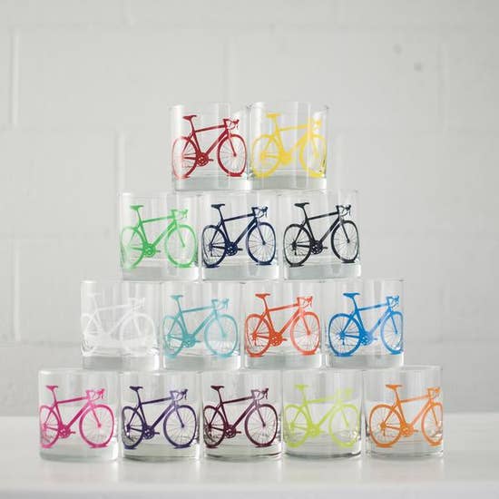 Vital Glasses with a bicycle printed on them in colors red, yellow, green, blue, black, blue, pink, orange, yellow