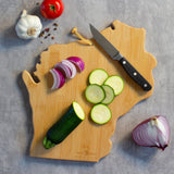 Totally Bamboo Summer Stokes Wisconsin Serving Board used as a cutting board