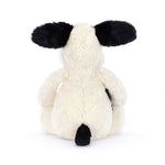 Black and Cream Puppy Stuffed Animal on a white background backside