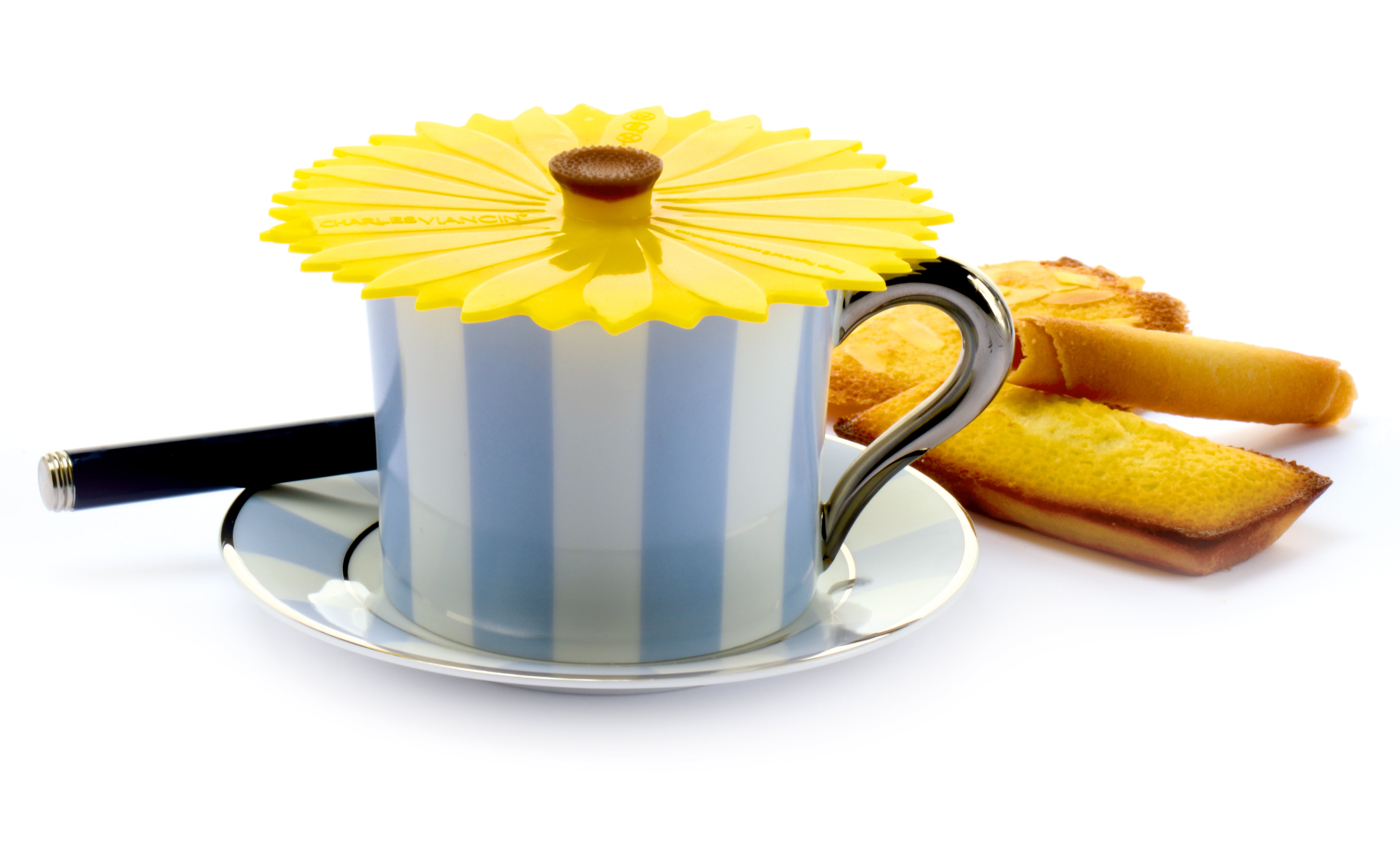 Charles Viancin Drink Cover Sunflower covering a cup of coffee with cookies