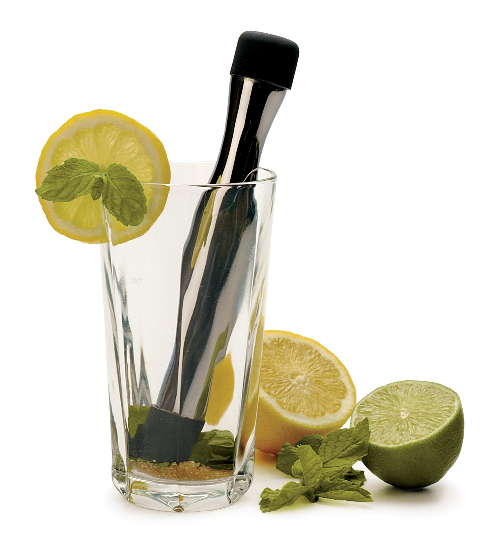 Stainless Steel Muddler crushing lemon and lime in a glass